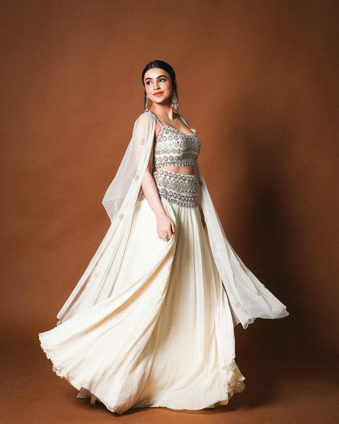 Ankita Sharma in Ivory Hand-embroidered Tulle Cape and Georgette skirt